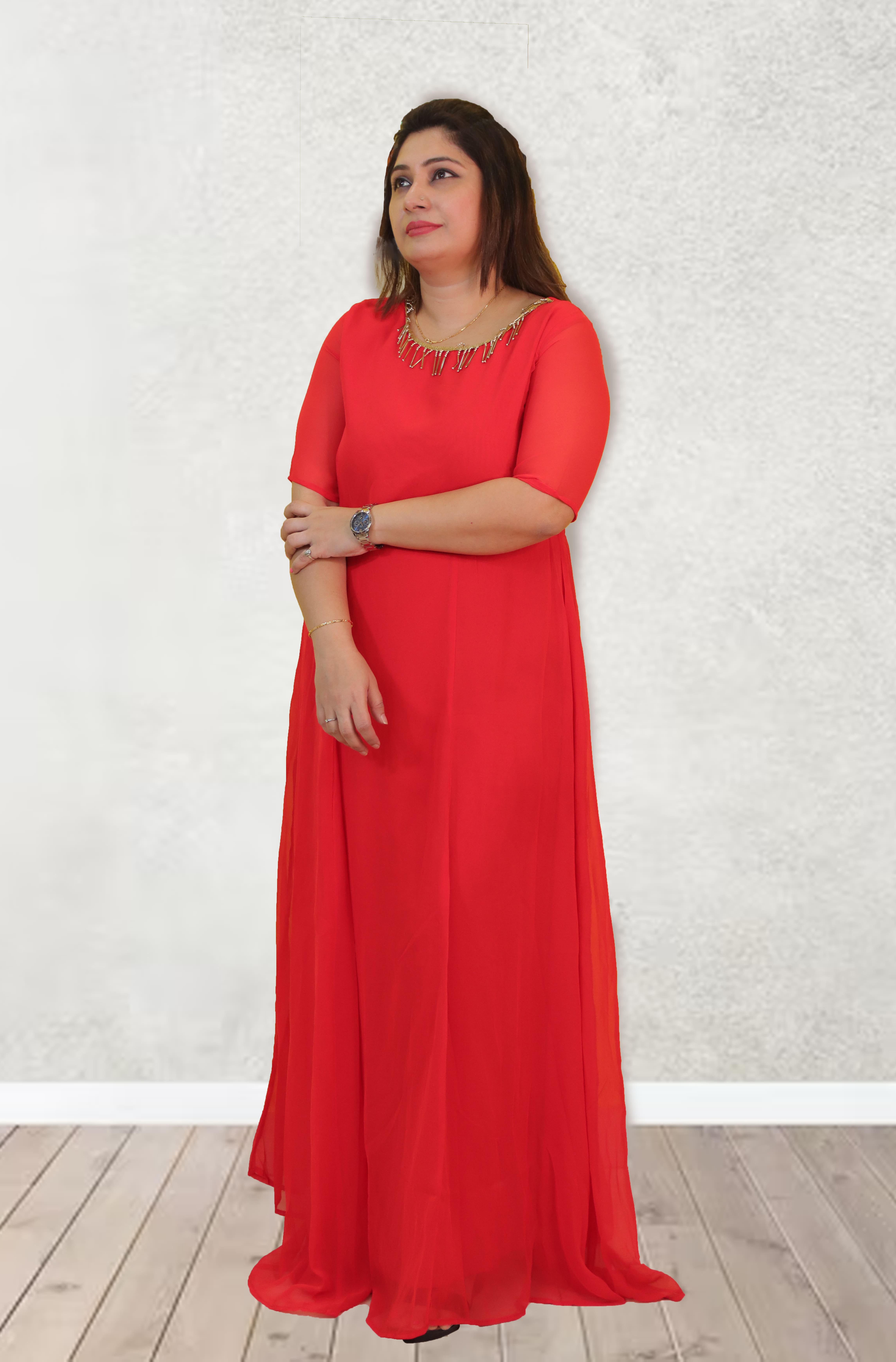 Red faux georgette long party wear gown.