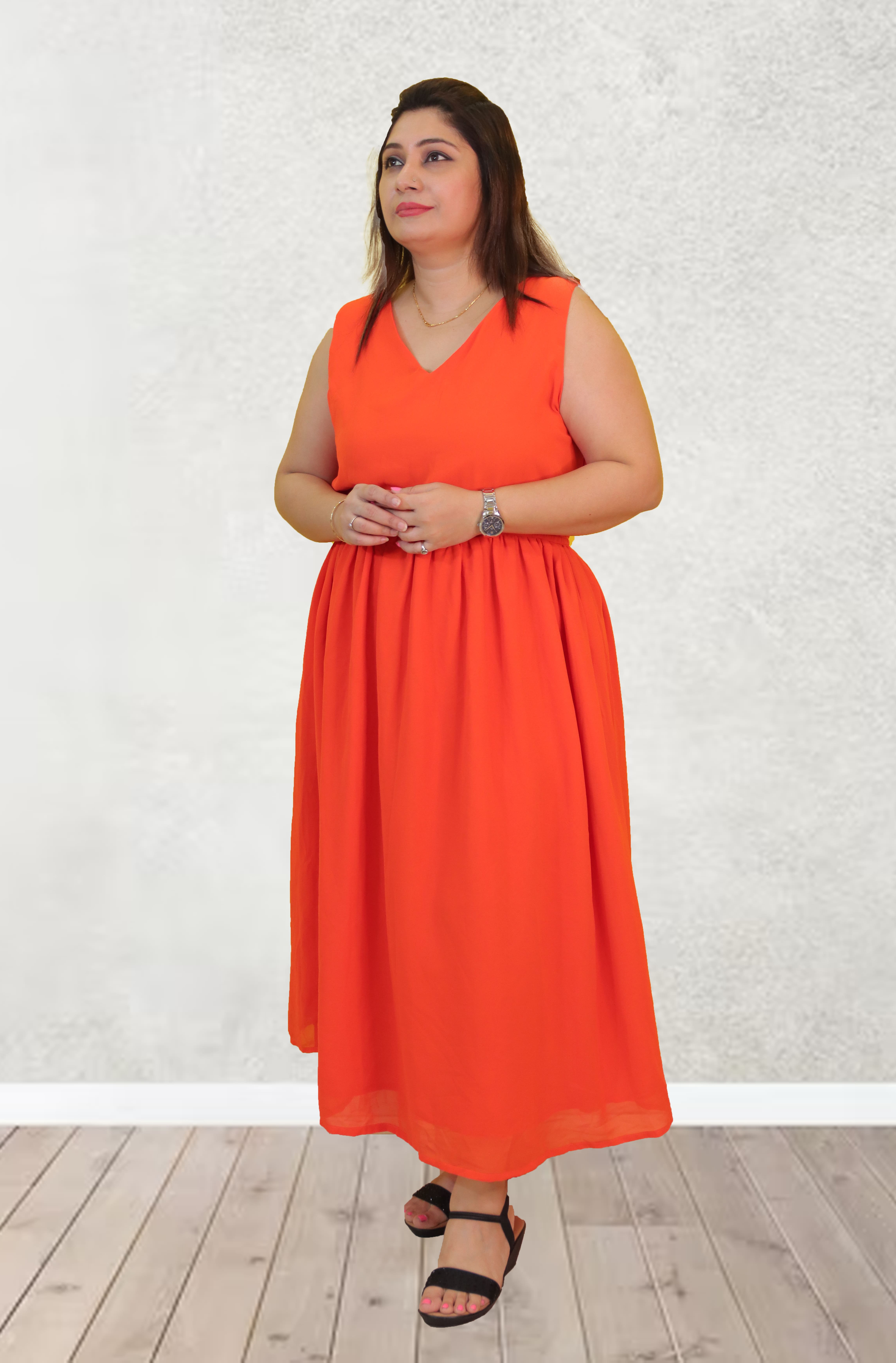 Orange faux georgette sleeveless party wear midi gown