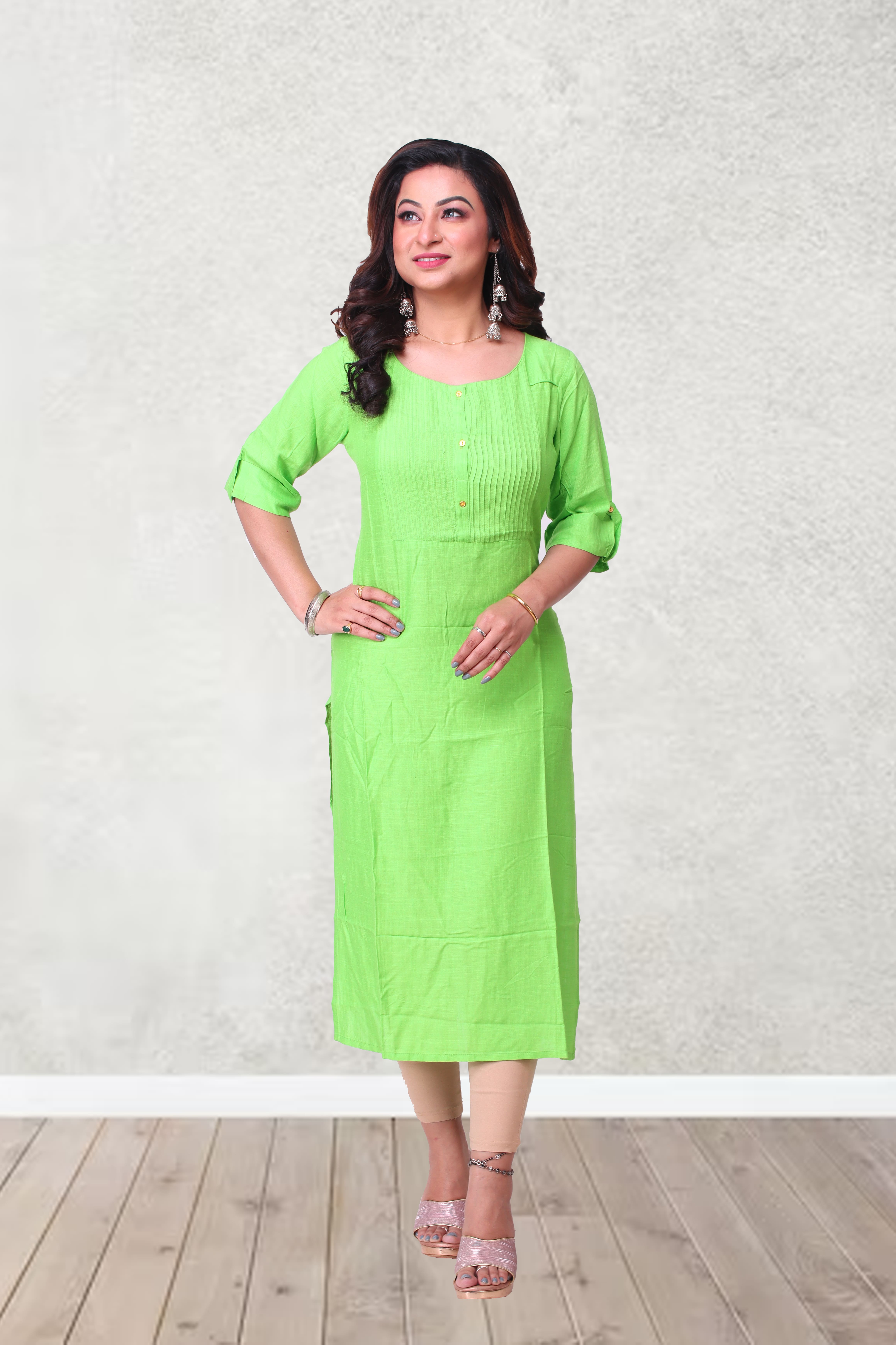 Fluorescent green cotton kurti-wash and wear material.3/4th sleeves